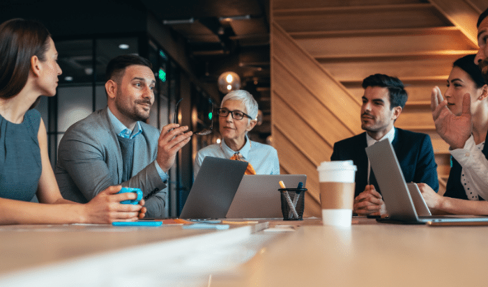 Company meeting at a table